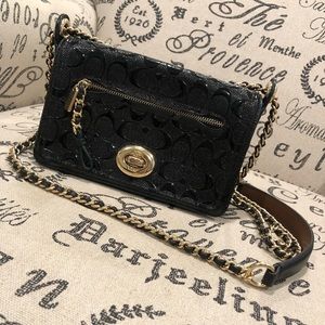 black leather Coach monogram bag